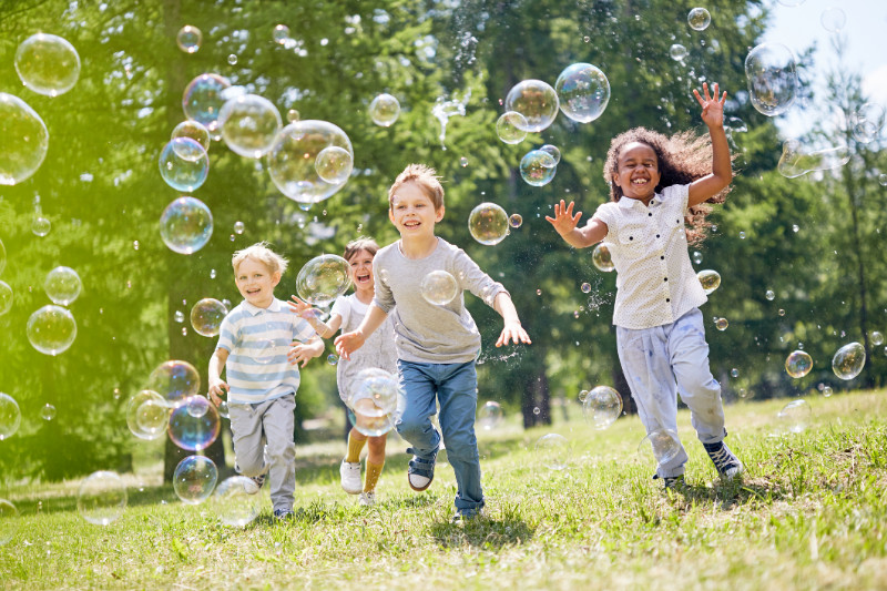 Kids having fun with buubles